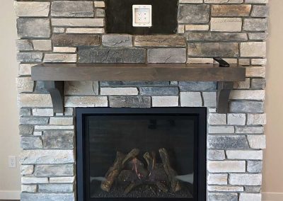 Fireplace with stone surround