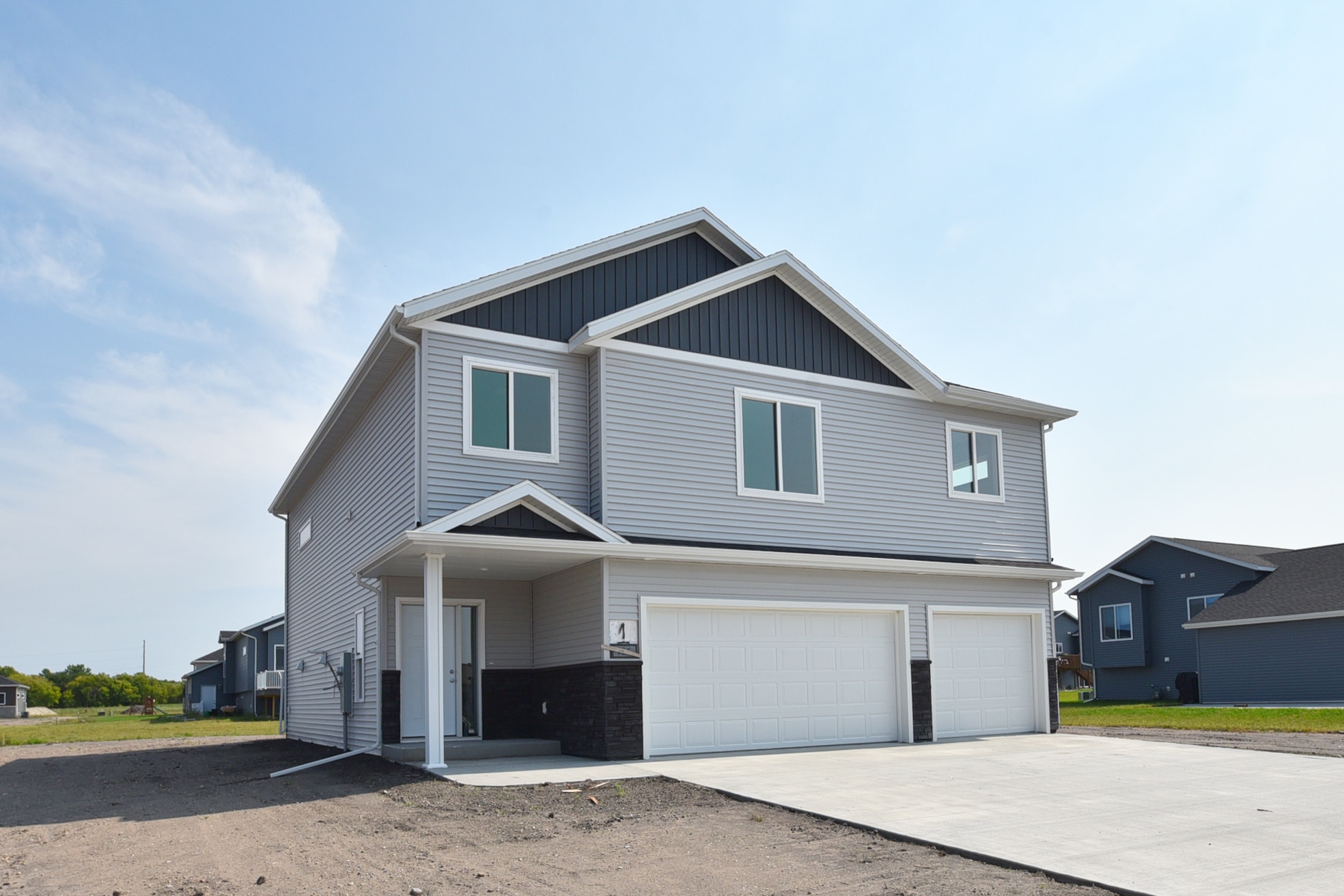 Exterior view of 2 story, 2 1/2 car garage home