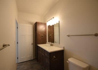 View of bathroom sink and vanity