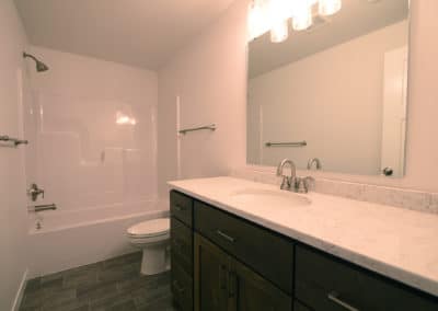 View of bathroom with tub and shower