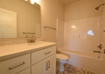 View of bathroom with tub and shower